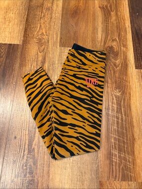 Nike Kids Tiger Stripe Leggings in Mustard and Black with Pink Logo